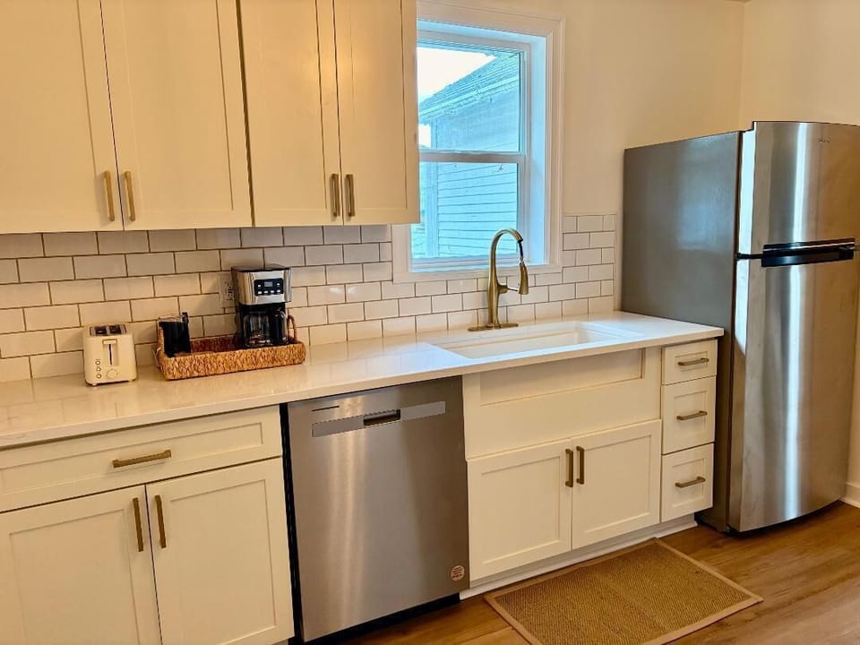 All new appliances, and stocked cupboards with all cookware you need. Dishes etc