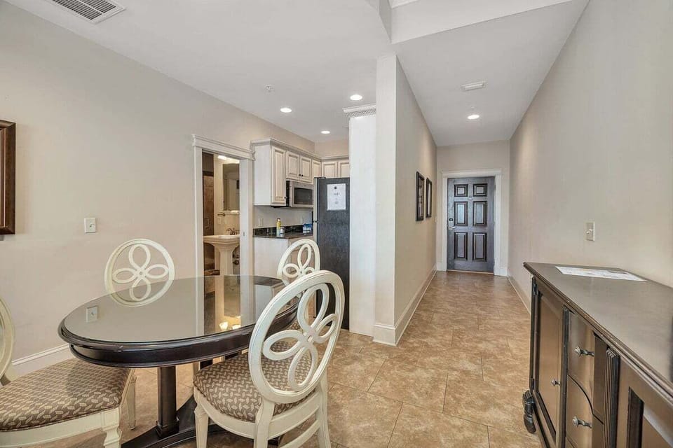 Sea Gate #301  View of Entry Hallway  and Kitchen from Dining Area