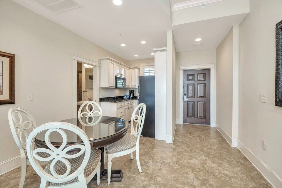 Sea Gate #207 View of Entry Hallway  and Kitchen from Dining Area