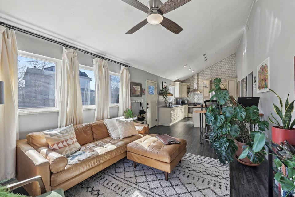 Another view of the living room, dining area and kitchen