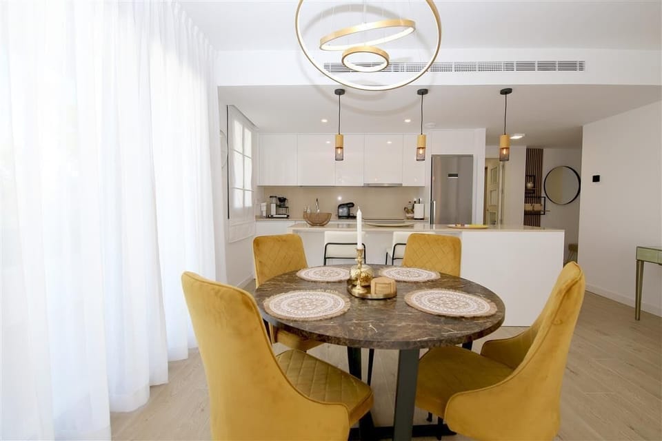 Modern dining area with space for four guests