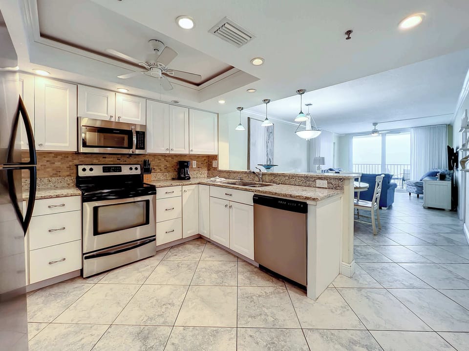 With ample cabinetry and expansive cooking space!