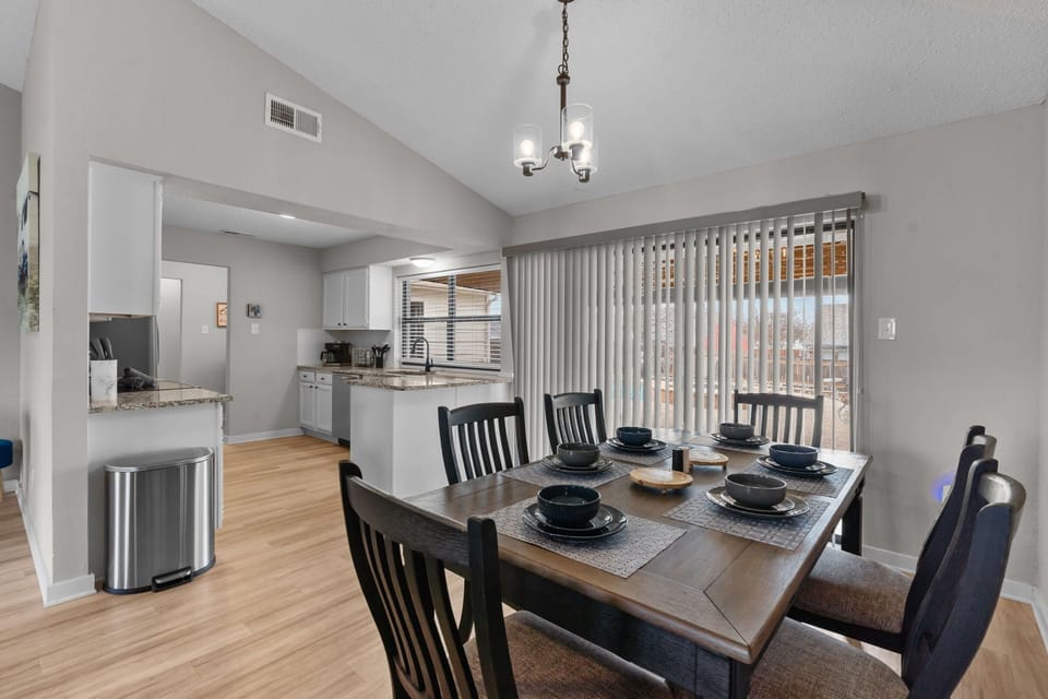 The dining area near the pool area in the backyard.