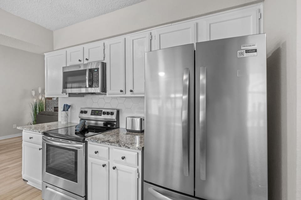Plenty of space for family & friends for cooking in a modern kitchen.