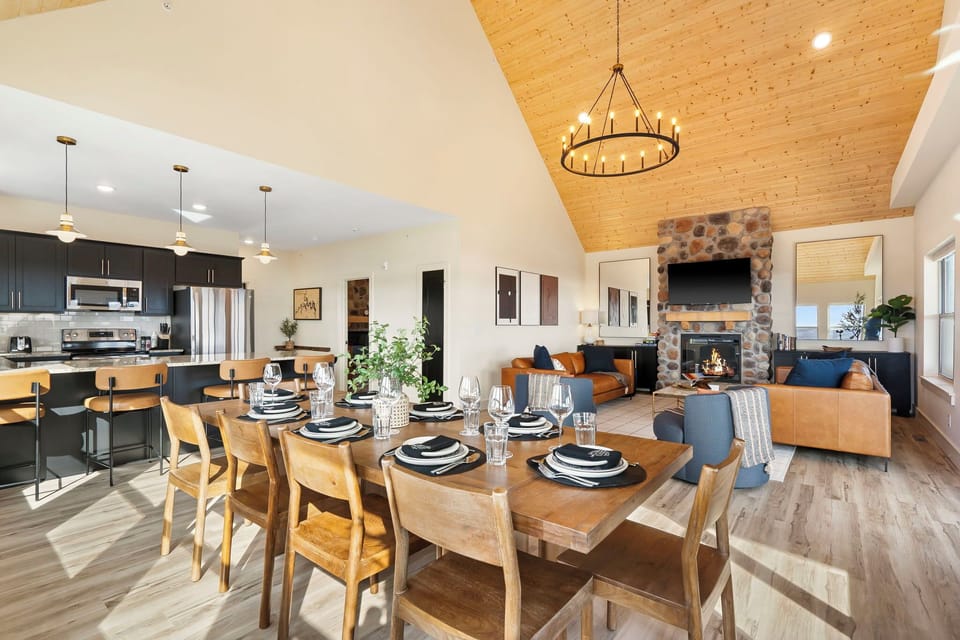 Main living spaces are on the upper floor of this home: Open kitchen with dining seating for the whole family!