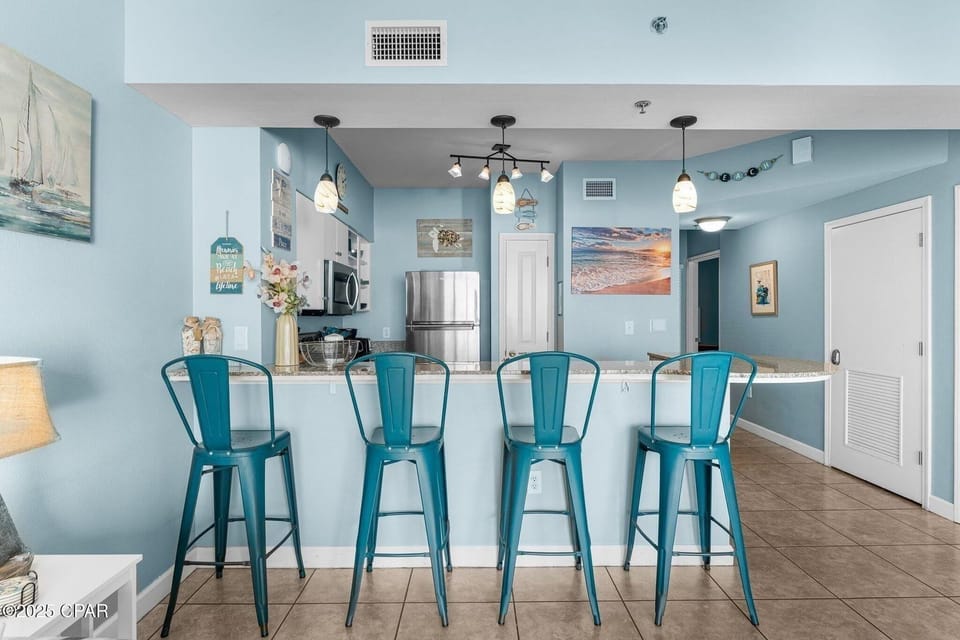 Breakfast bar attached to full kitchen