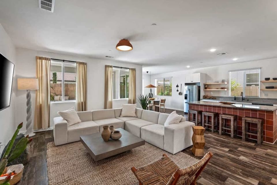 Living area with kitchen and dining areas