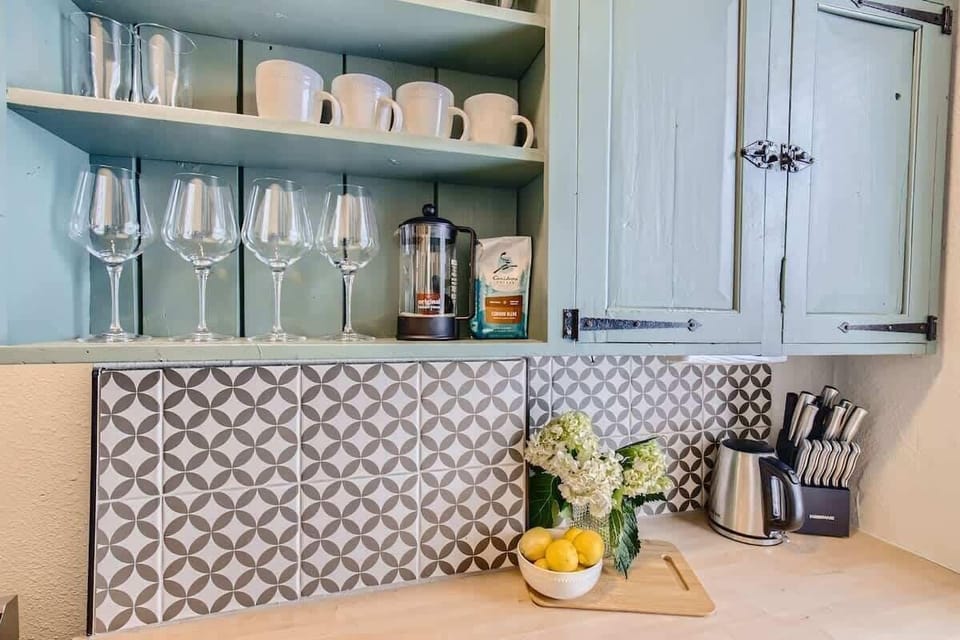 The kitchen comes equipped with all the essentials you need to prep meals from home