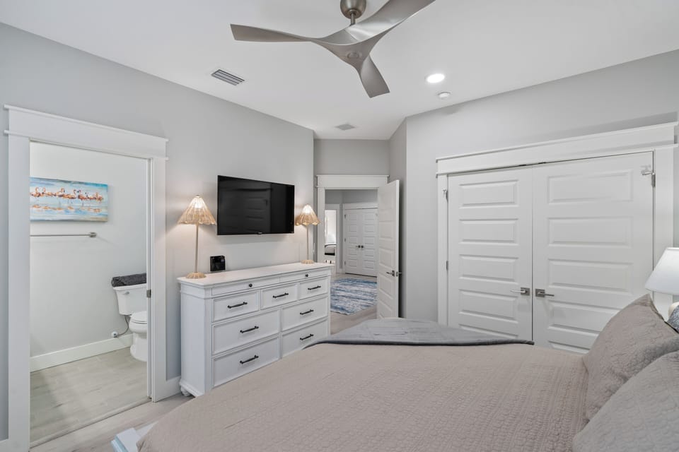 Bedroom #6 includes a flat-screen TV.