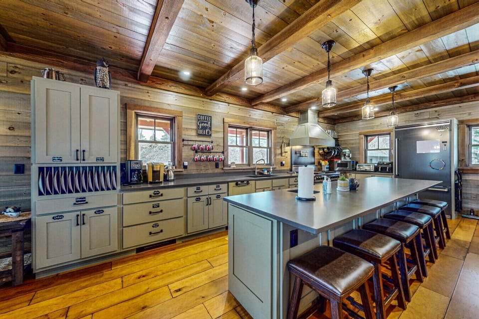 The kitchen has premium appliances, along with a set of top-quality pots and pans for your culinary adventures.