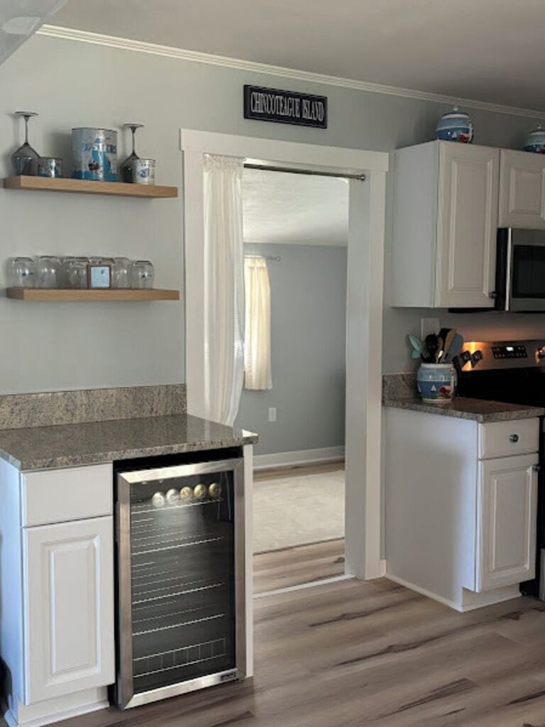 Small bar in kitchen with beverage fridge!