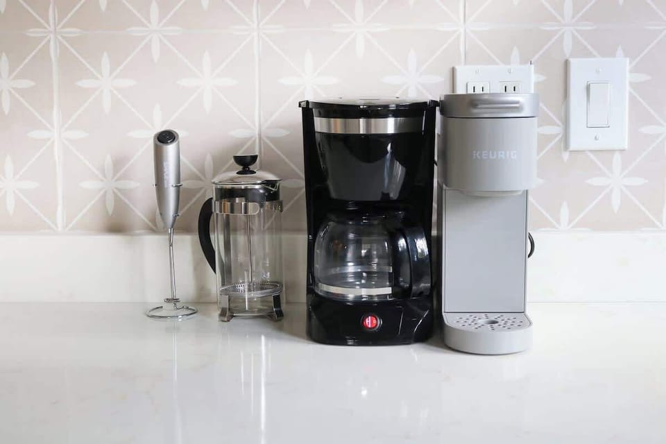 Are you a coffee drinker? We provide K-Cups, Creamer and Sugar during your stay! Make your favorite cup of joe with our Keurig, Black Coffee Maker, French Press and Frother found at your coffee station! 