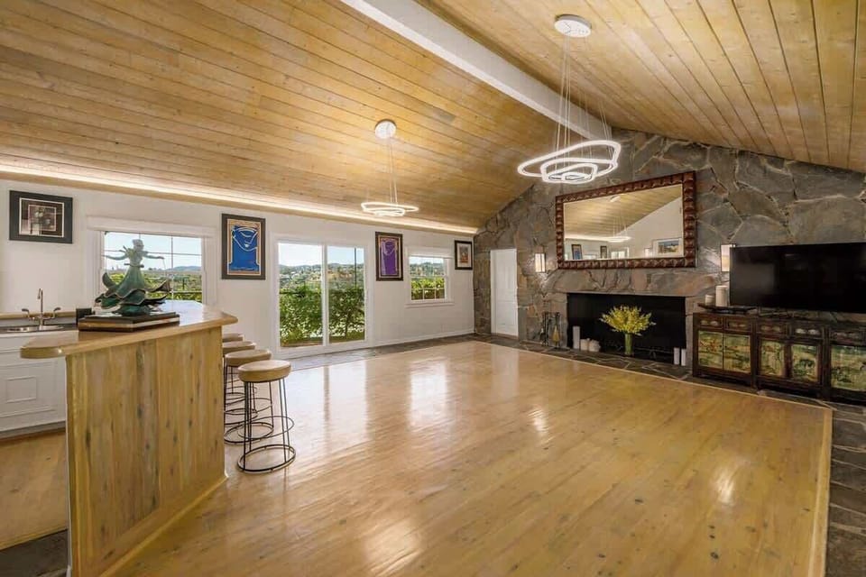 The Bonus Room.... 
it's a party space, a yoga studio or gym, 
it's a home office, creative space, artist's studio. 
It's whatever you imagine it to be....