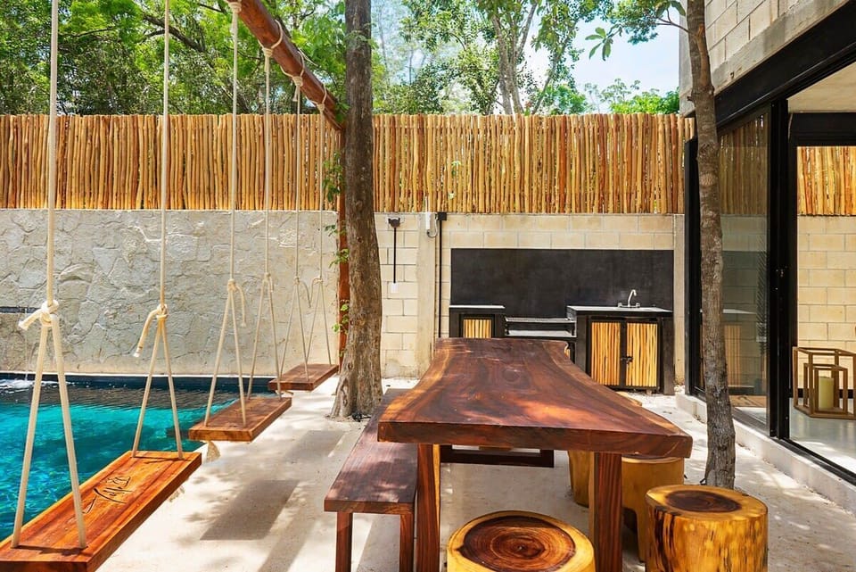 Outdoor table with swings