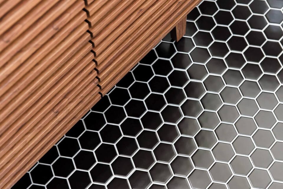 Modern black hexagon tiles with crisp white grout