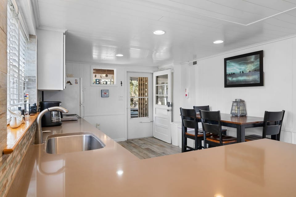 Kitchen & Dining: Bright space with modern appliances and a charming dining setup for meal magic!