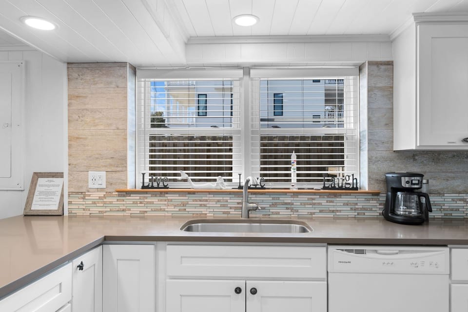 Kitchen: Bright and airy with modern finishes, perfect for culinary adventures!