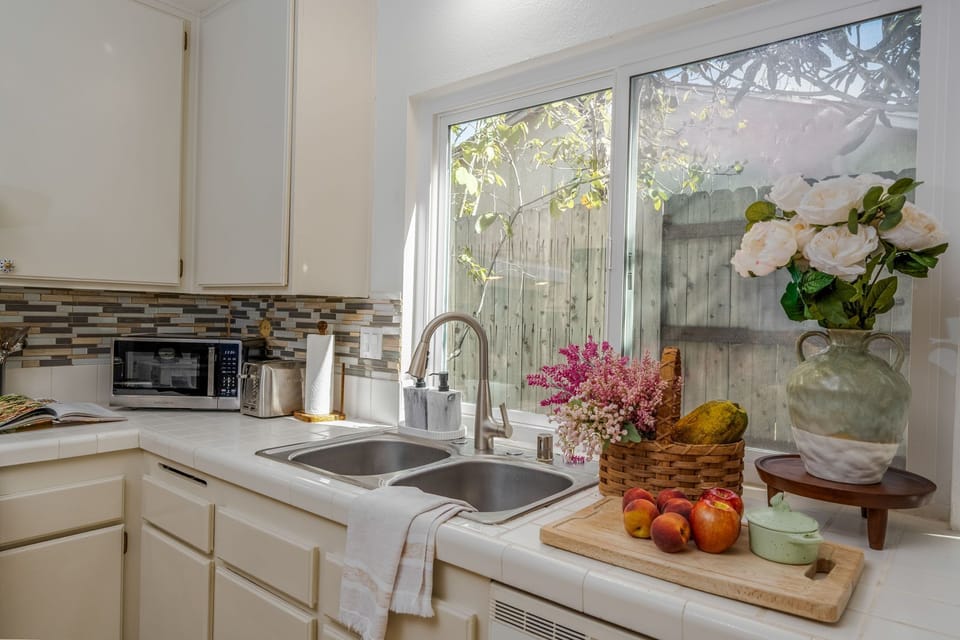 Well-equipped kitchen with cookware, spices and everything needed for cooking.