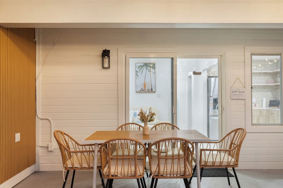 Private and cozy – an enclosed outdoor dining area for a tranquil meal experience.