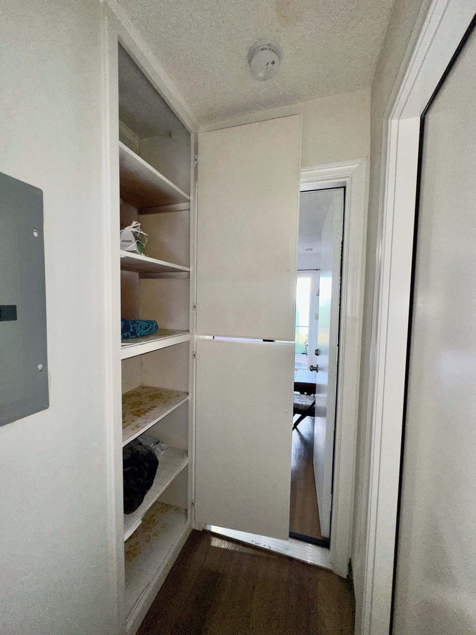 Priavate cabinet for clothing store. Steam iron in the cabinet .