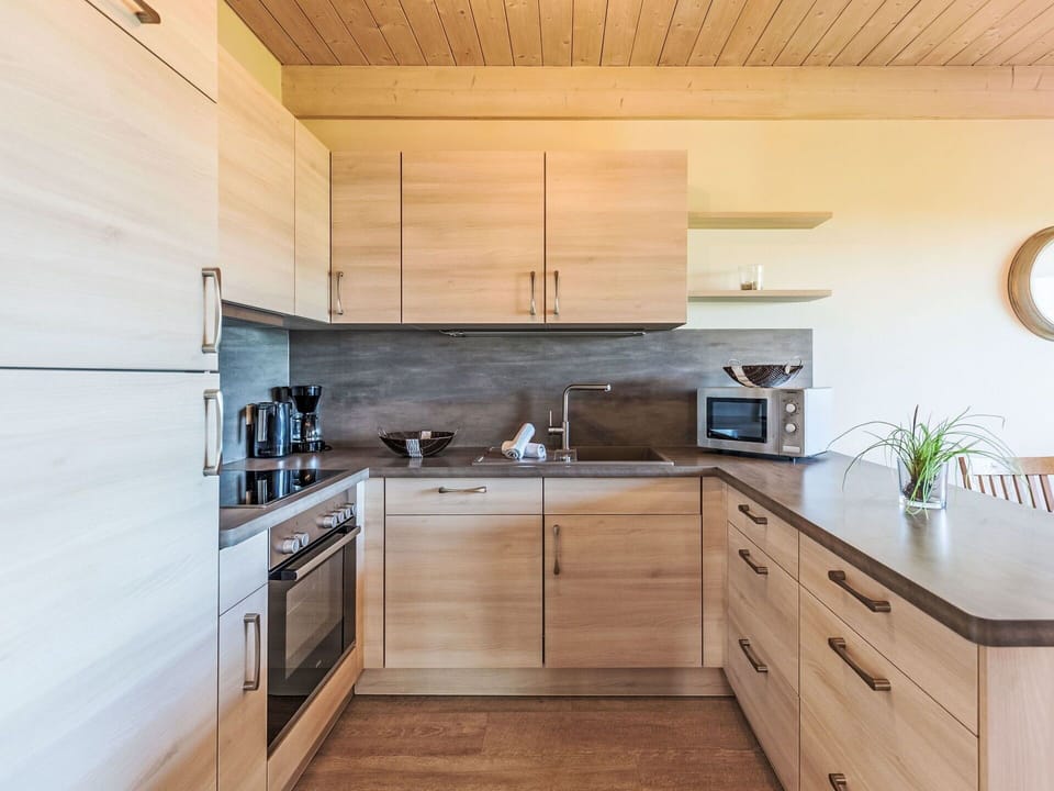 Flooring, Kitchen, Furniture, Cabinetry, Countertop, Wood, Floor, Interior Design, Wood Flooring, Kitchen Appliance