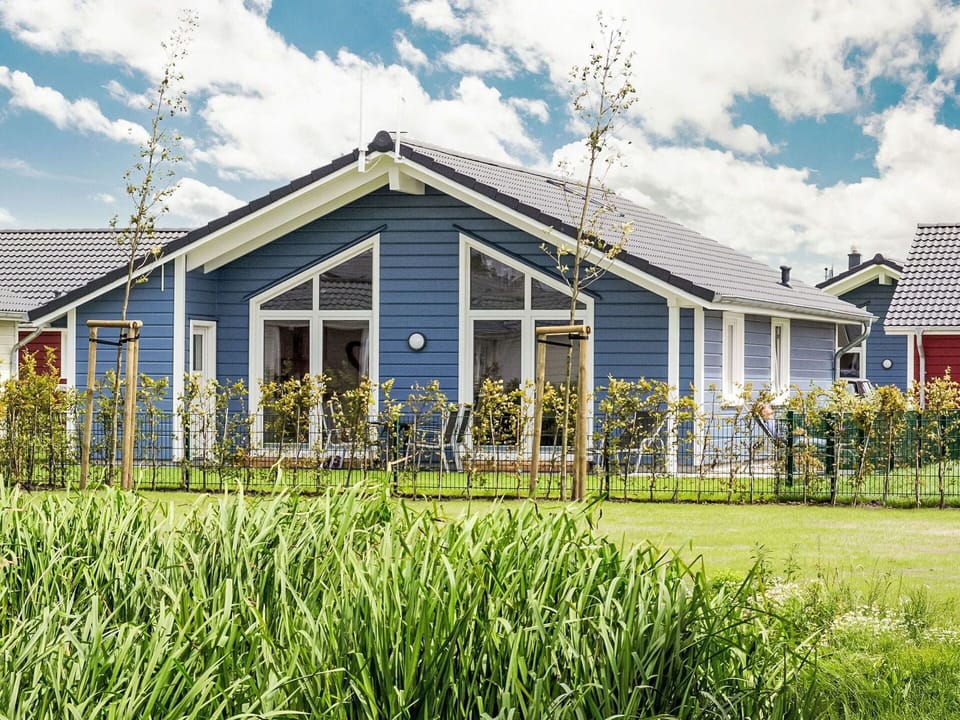 Blue, Home, Cottage, Siding, House, Roof, Groundcover, Estate, Garden, Yard