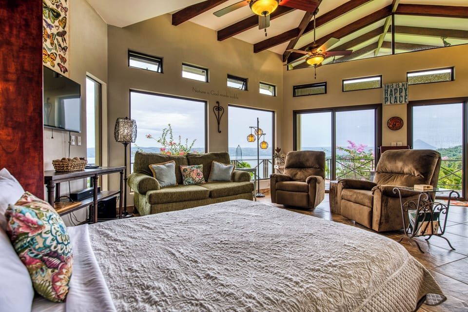 The queen-size murphy bed in the livingroom is perfect for a sunrise wake-up with spectacular views from every window.