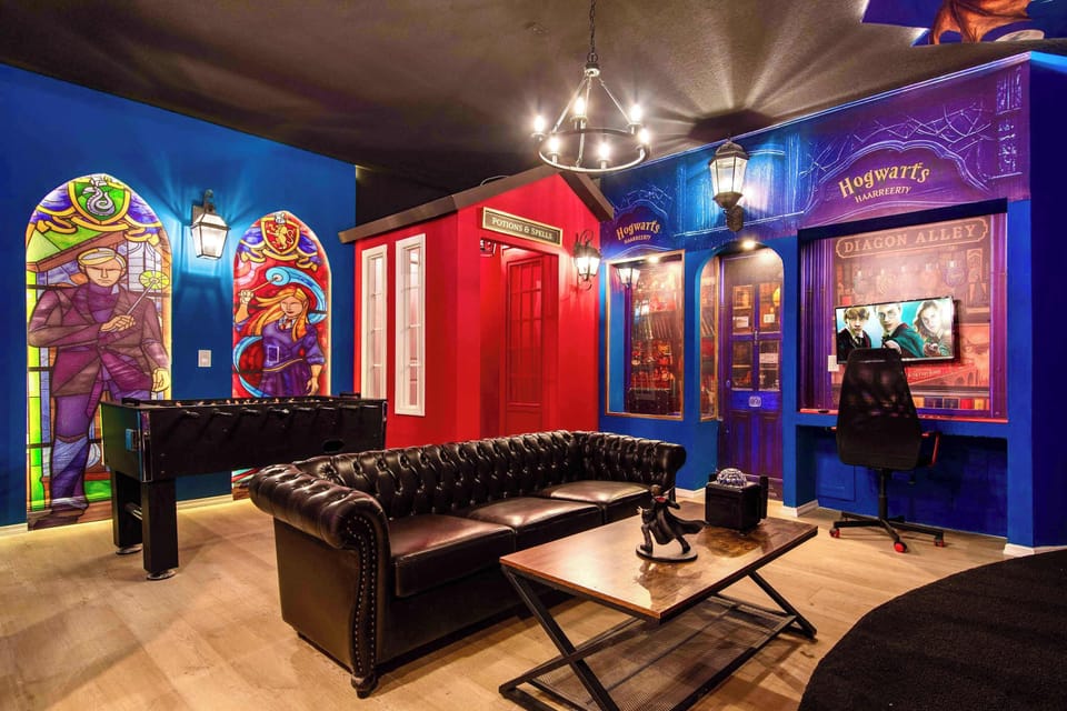 Magical game room with wizard-themed decor, foosball, and cozy lounge vibes
