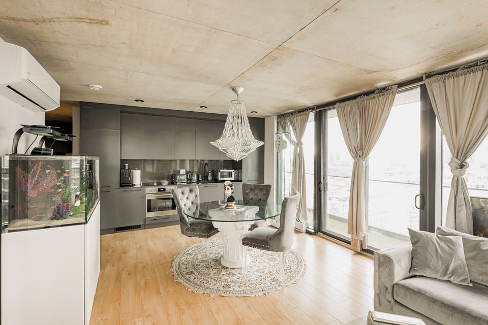 Wraparound windows flood the space with natural light and style.