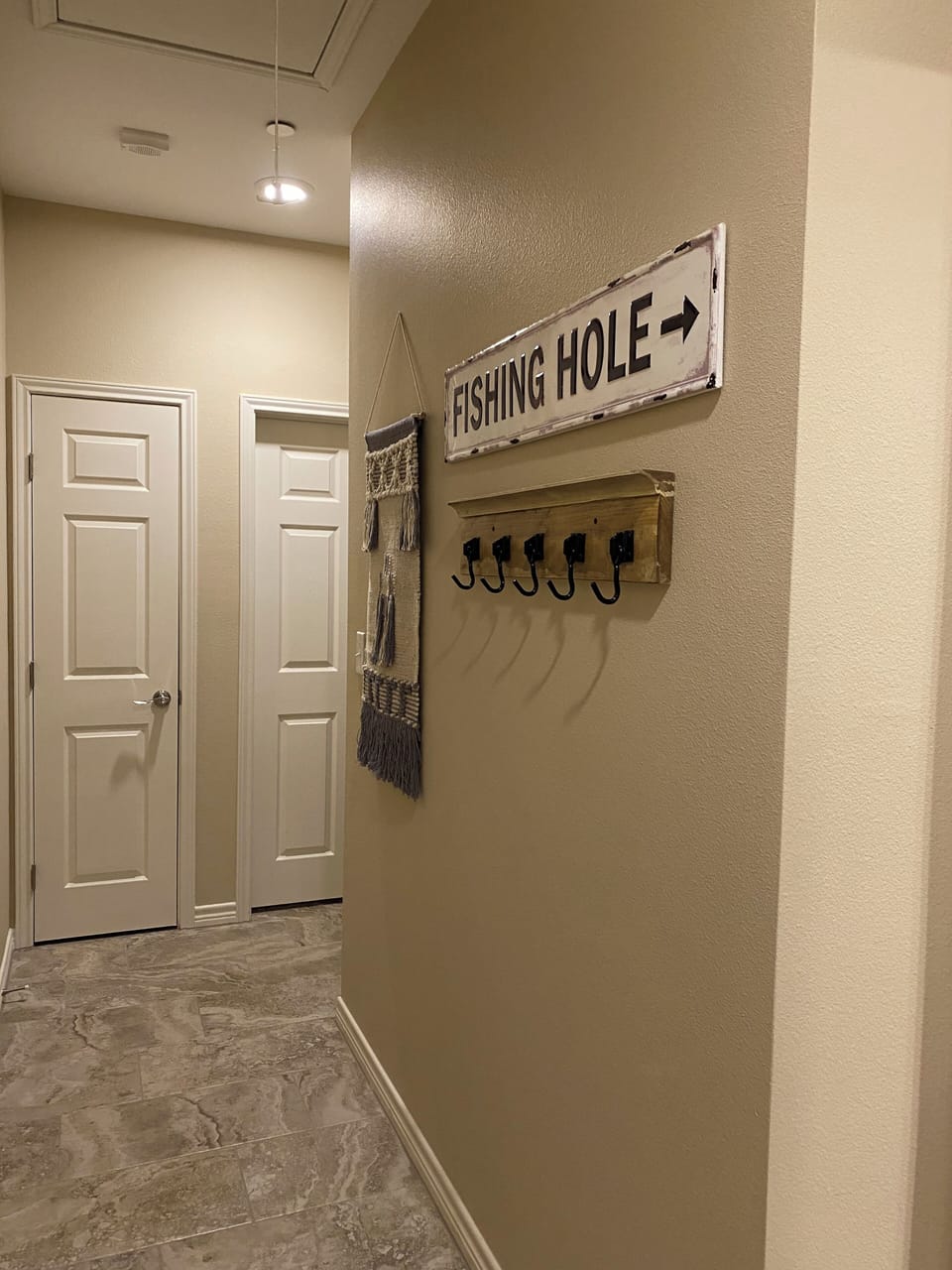 Additional hooks in hallway for beach towels or swimsuits