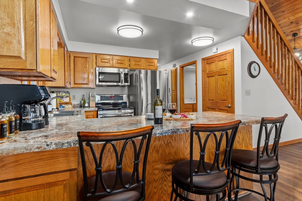 The kitchen features modern appliances, making meal prep effortless and enjoyable.