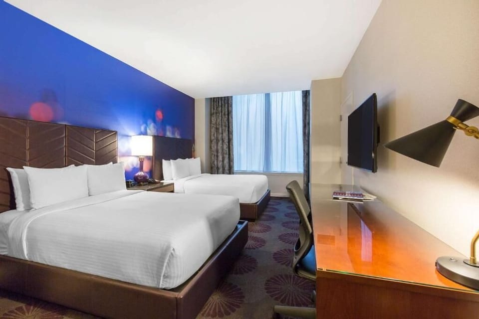 Work with ease, then relax across two inviting beds.