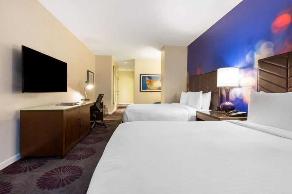 Settle in comfortably with twin beds and an easy workspace.