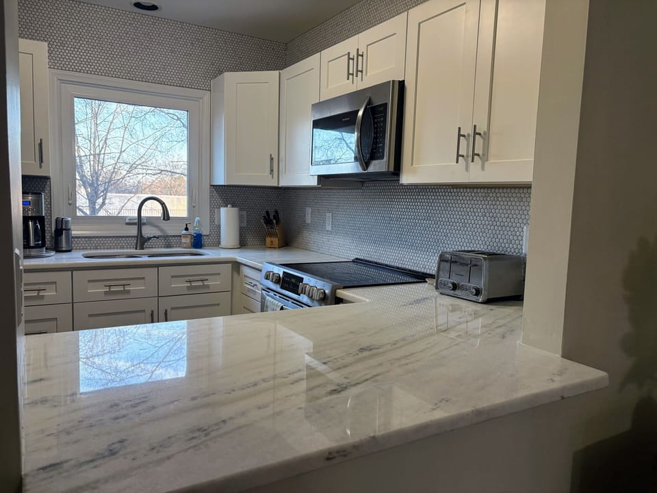 Kitchen stove, microwave, and toaster