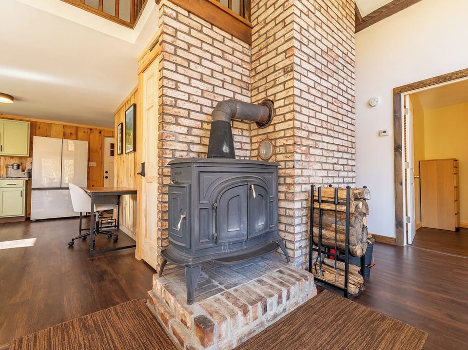 Enjoy sitting by the wood stove (since upgraded to a new efficient model)