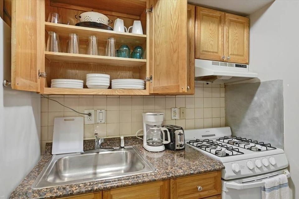 Kitchen comes equipped with toaster microwave coffee maker or flatware dishware and cookware.