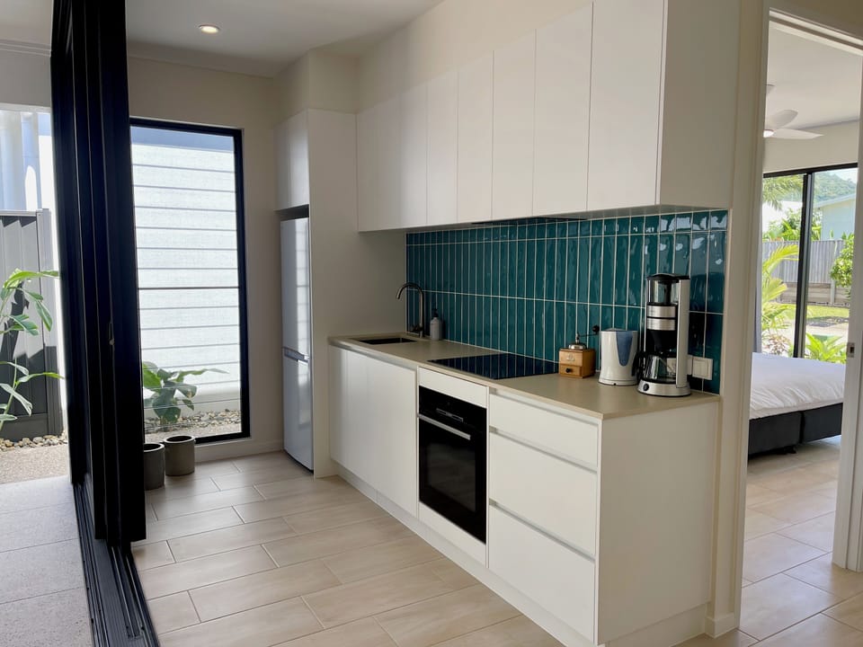 Fully equipped kitchen with dishwasher and large fridge