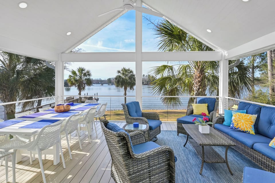 Screened-in porch with dining for 10 and separate seating area 