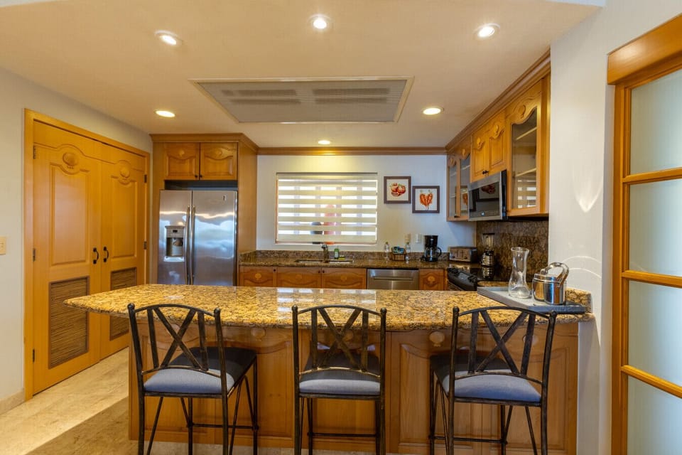 Pull up a chair and stay awhile - our kitchen was made for friends & family.