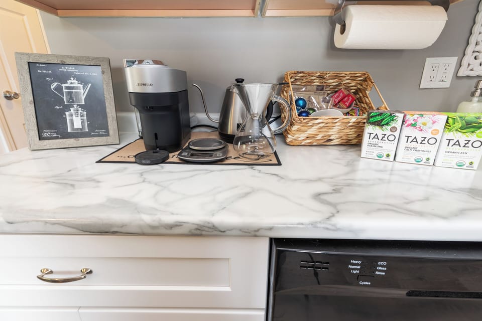coffee bar with nespresso pods, and pourover options. pods, and coffee from a local roaster provided