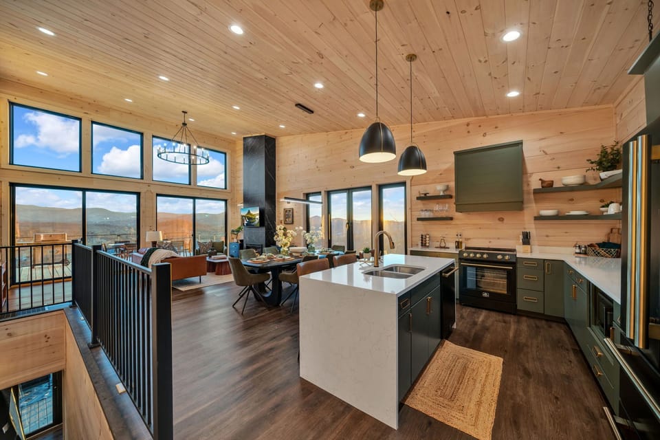 Large doors & windows showcase the amazing mountain views with spacious kitchen.