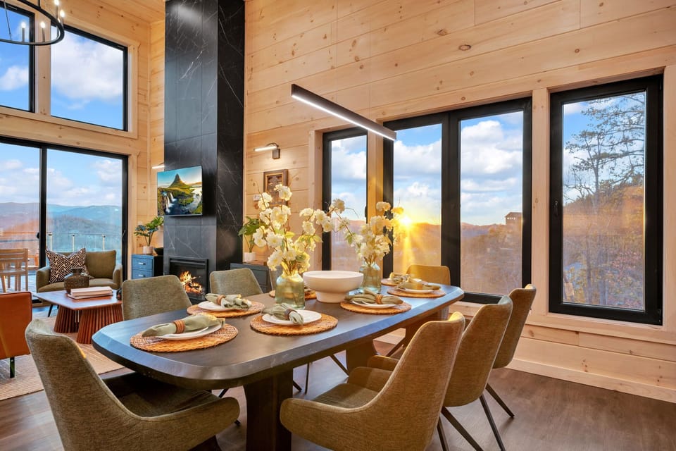 Stylish dining area with seating for 8 and an island with seating for 3.