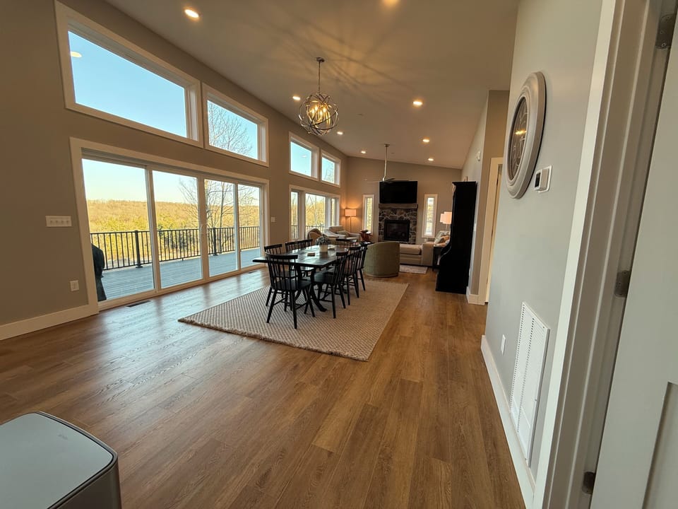 Looking at large dining room and living room from the kitchen