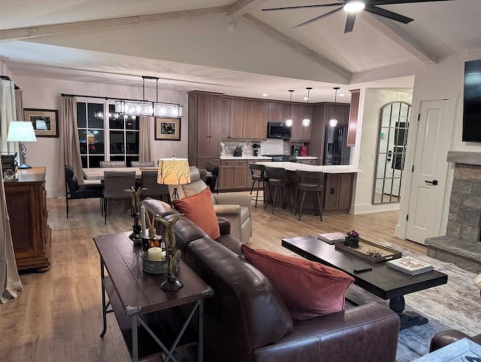 Large open area brings together the living, dining, and kitchen areas