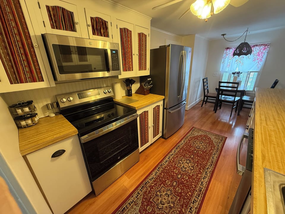 Fully stocked kitchen with new appliances.