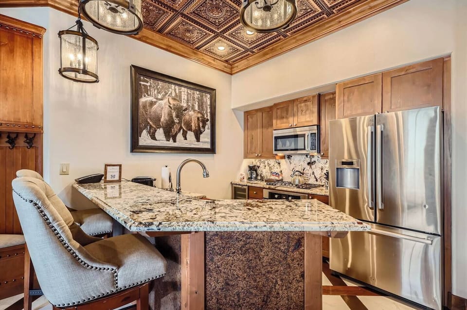 Bright open kitchen with modern appliances.