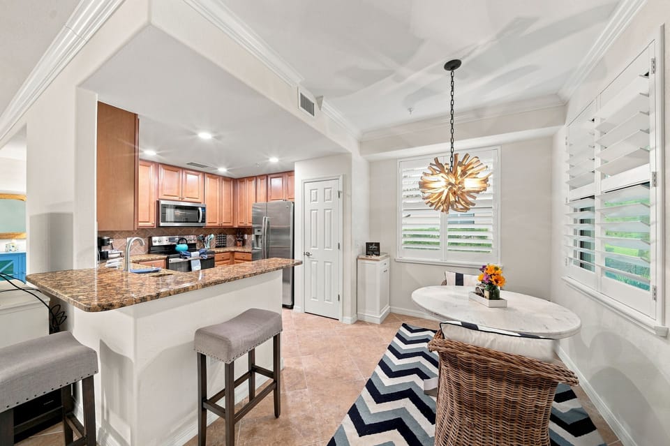 A cozy breakfast area beckons with additional stools at the counter
