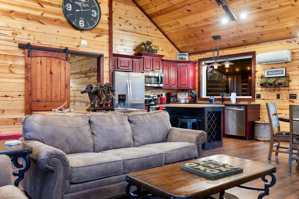 The cabin design blends rustic elements with modern comforts for a relaxing stay.