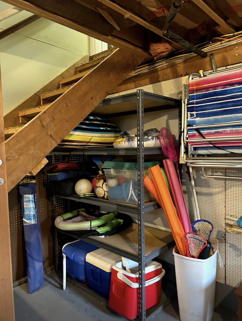 Plenty of beach supplies for the family! Includes several beach chairs, 3 umbrellas, a cooler, toys, and a wagon (not shown) for a fun day in the sun.