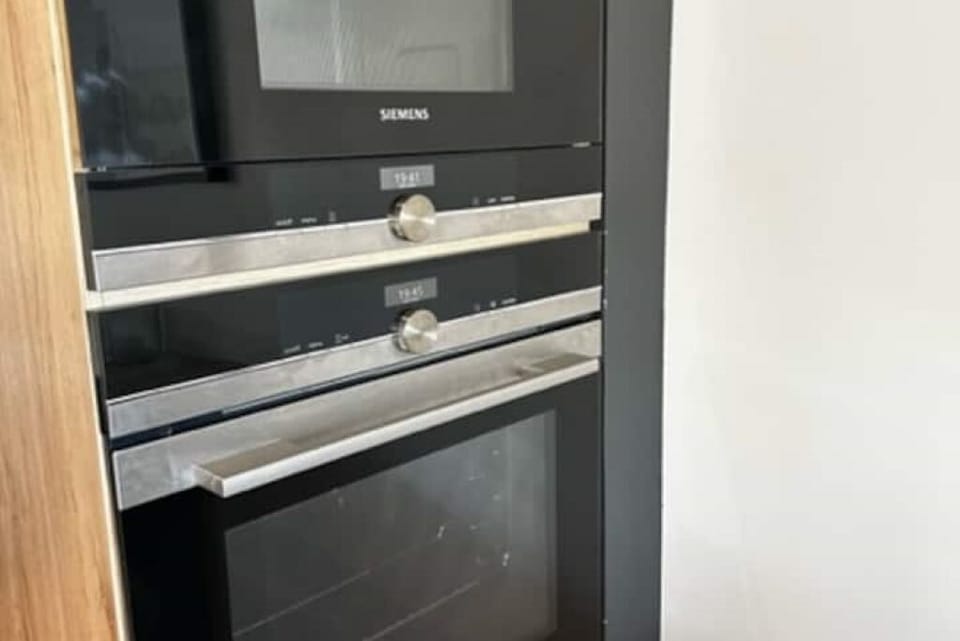 Well equipped kitchen. With two washing machines and a dryer